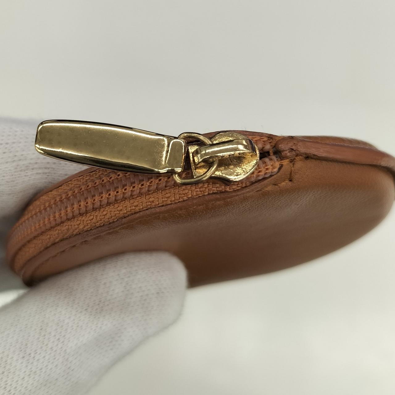 ファスナー金具キズ、変色あり