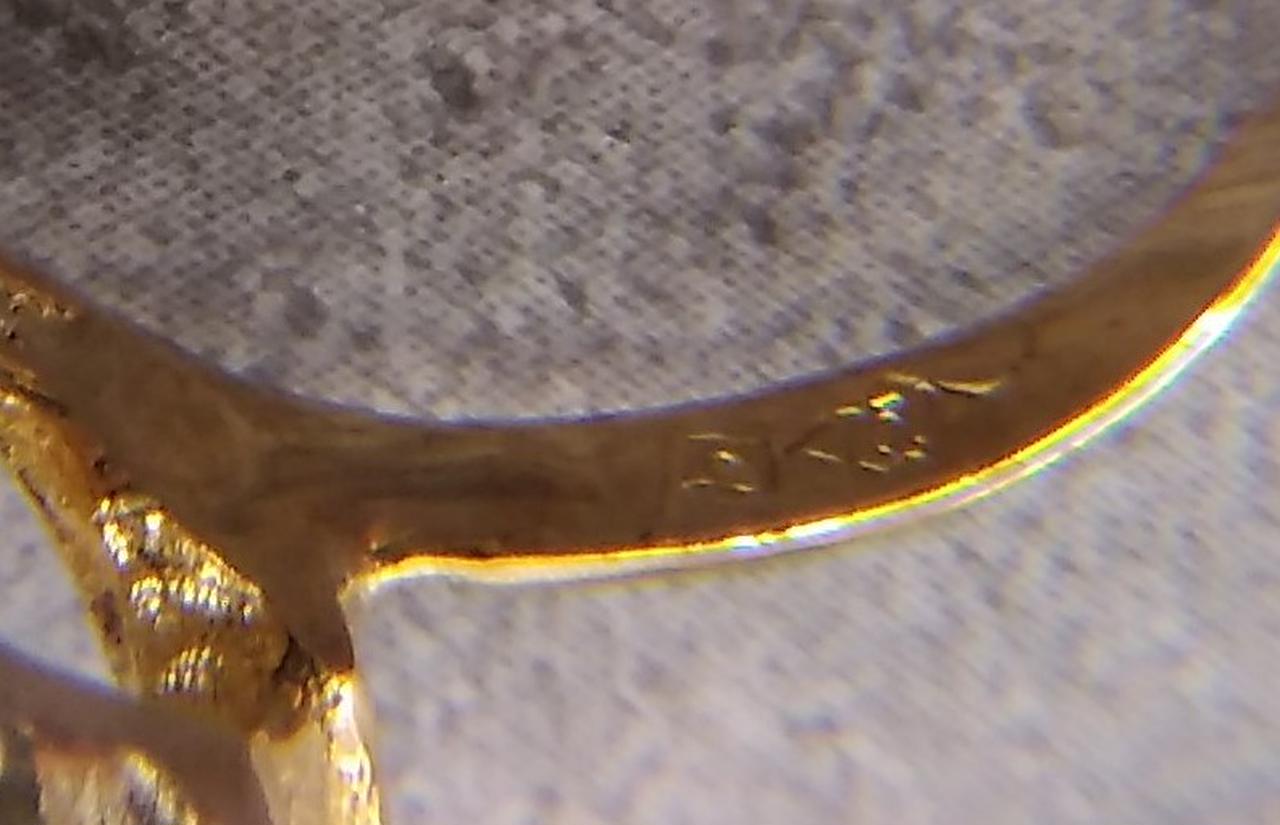 750の刻印と造幣局のマークあります