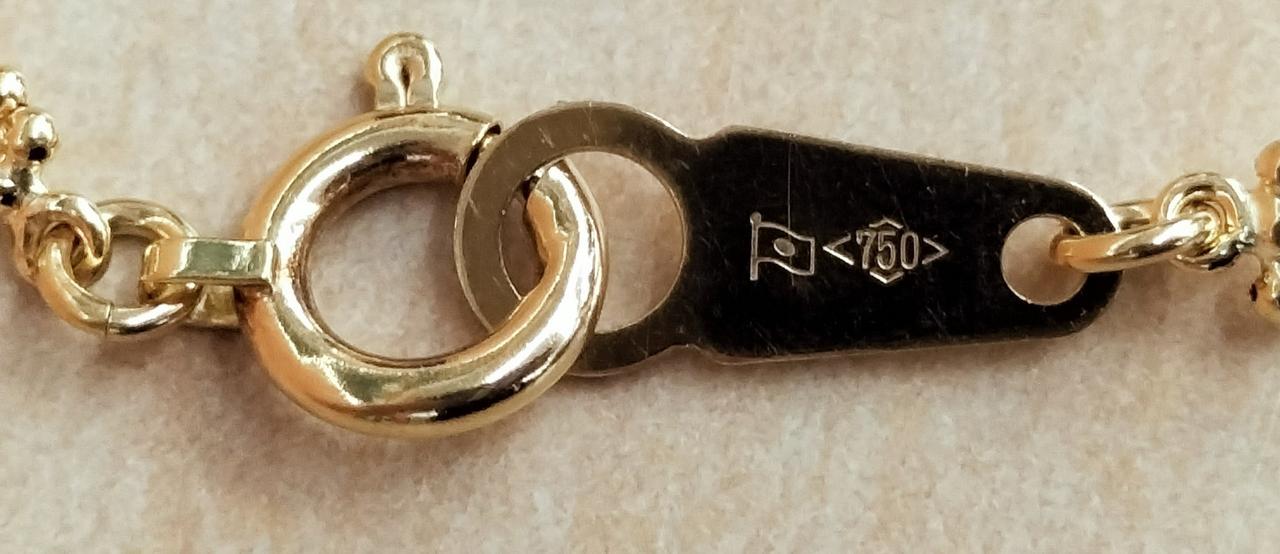 造幣局、750 の刻印あります