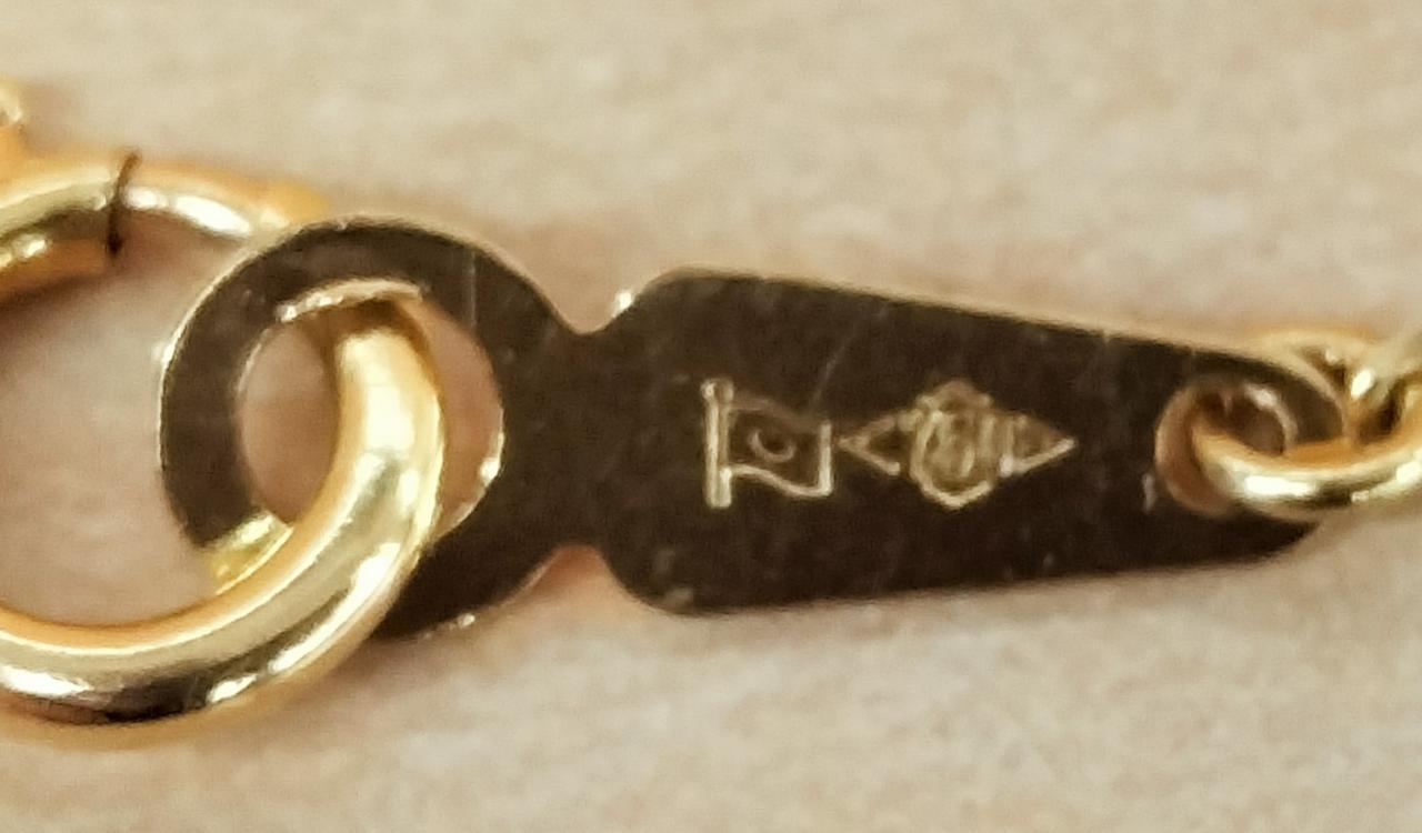 造幣局、750 の刻印あります