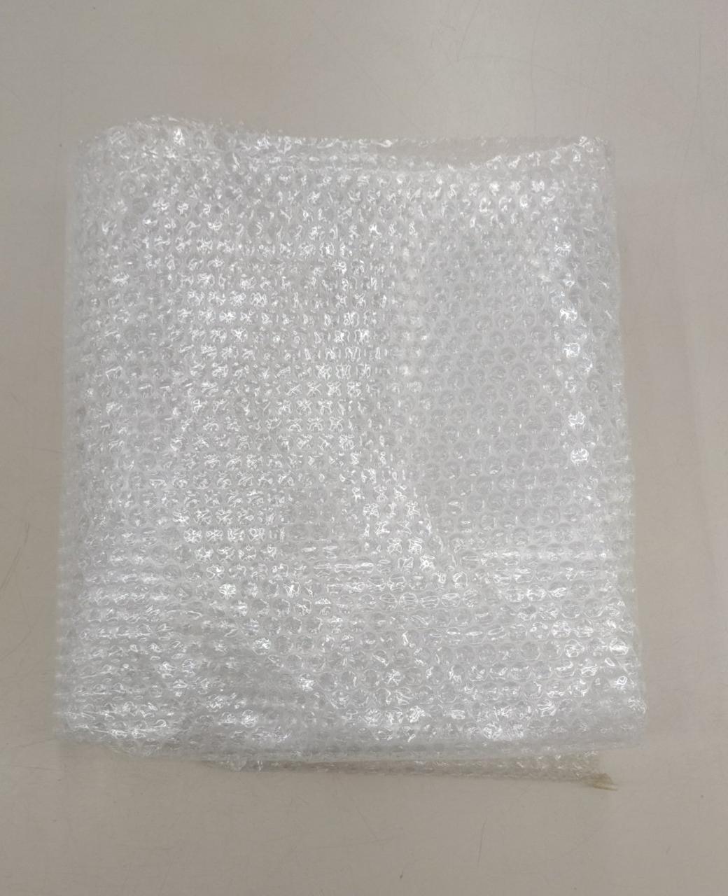 額を緩衝材で包んで箱に入れます