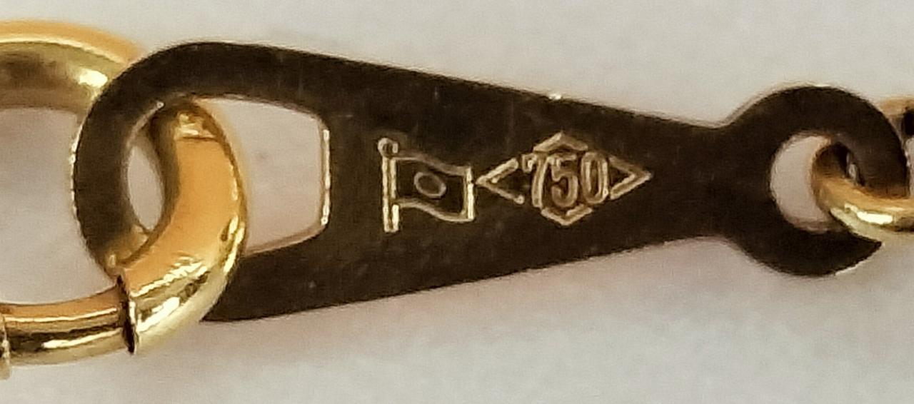 造幣局、750 の刻印あります