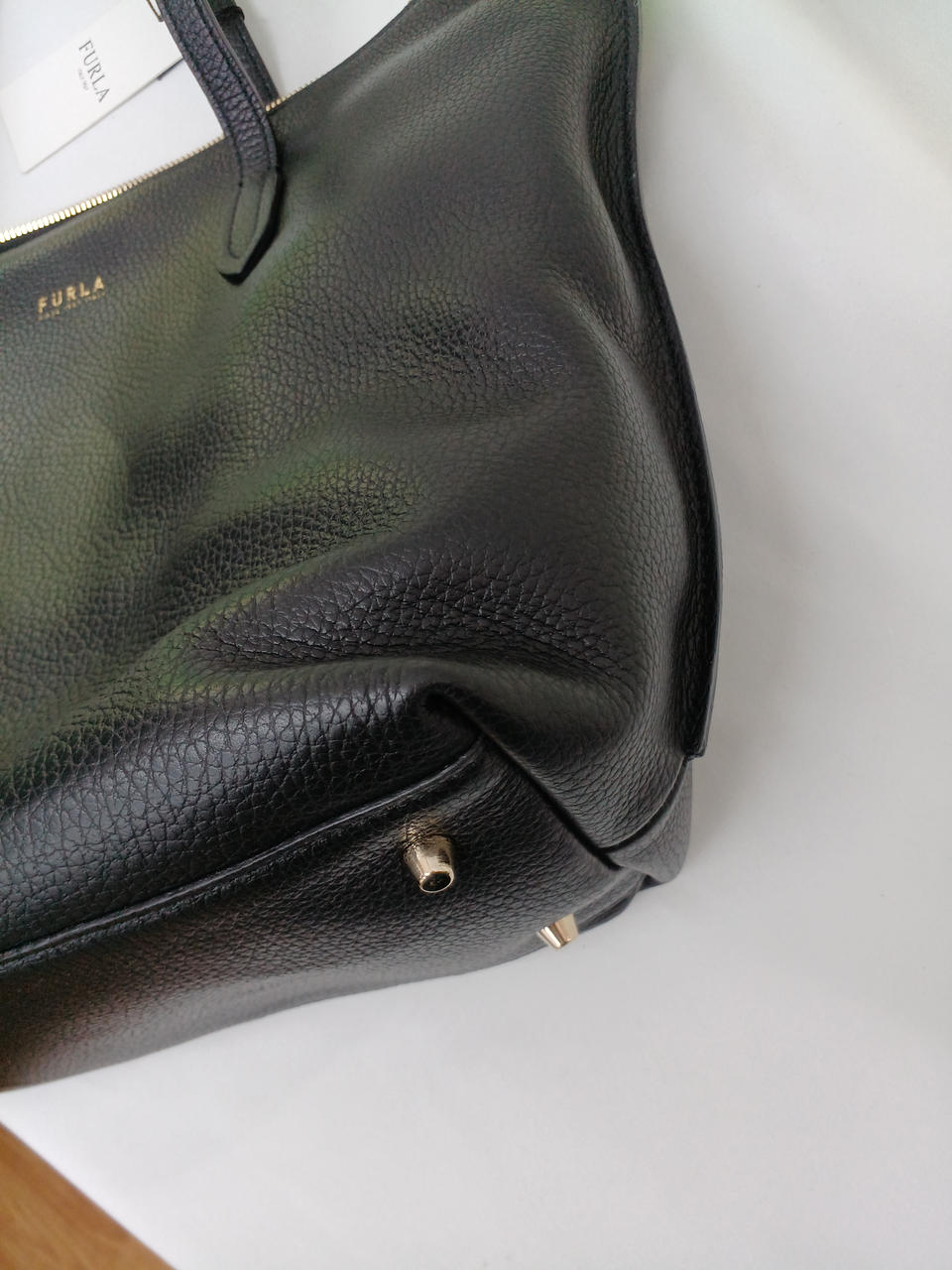 型崩れが下部分の角にあります