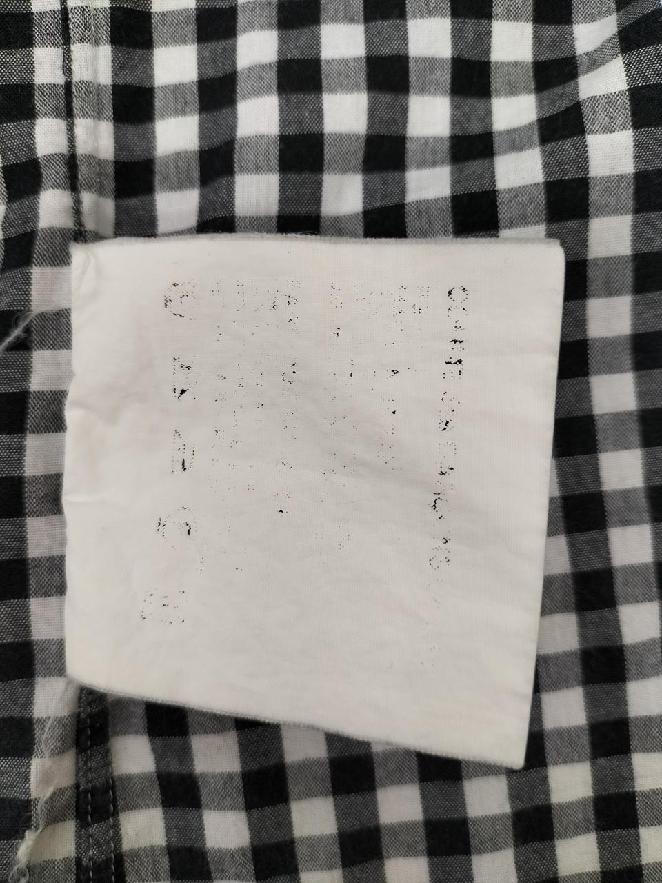 品質表示タグ文字が消えています