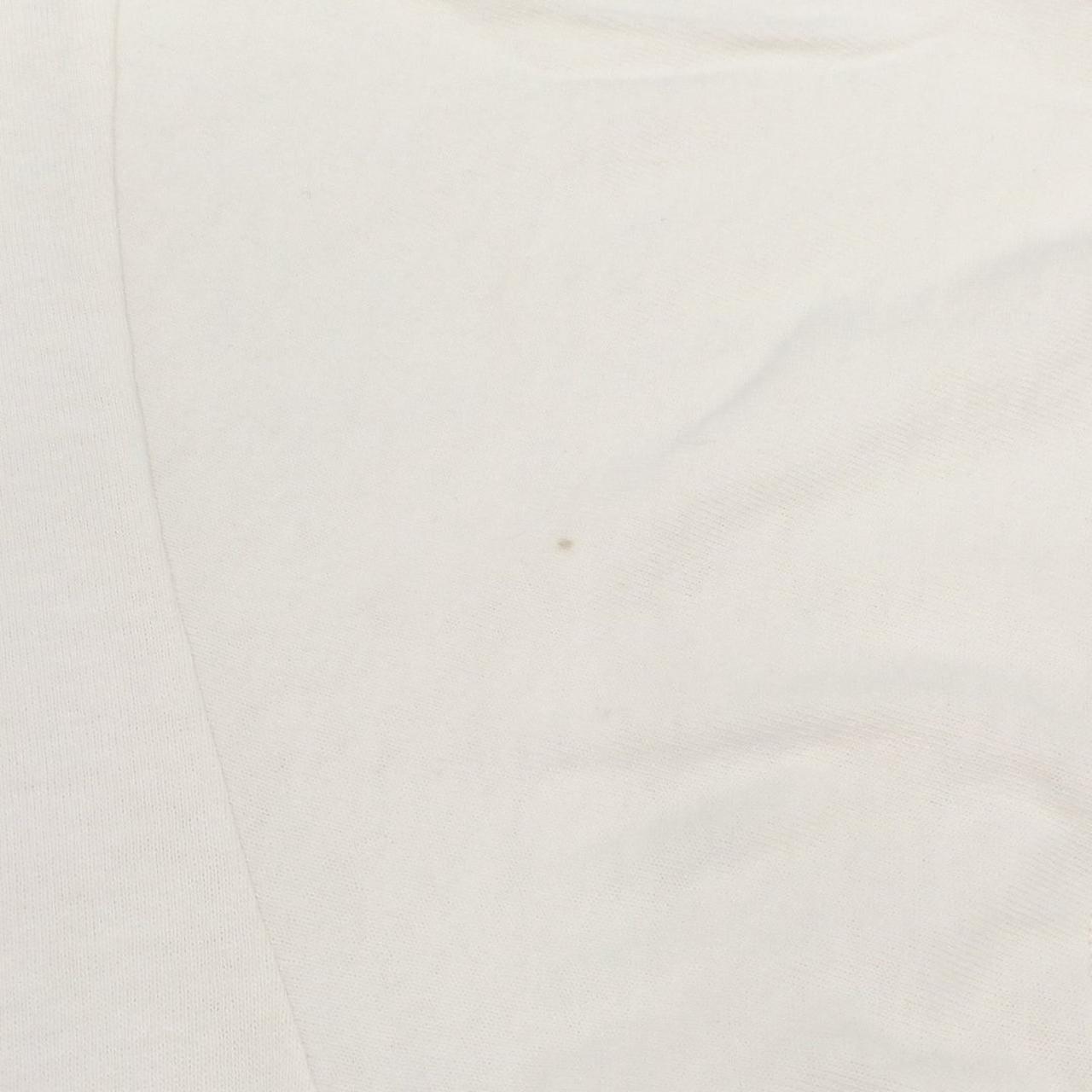 左袖に汚れあり