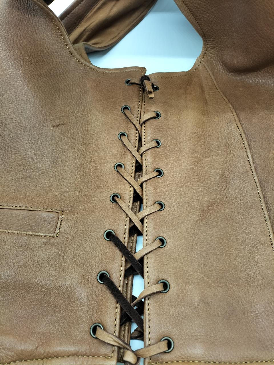 両サイド紐で編んでます