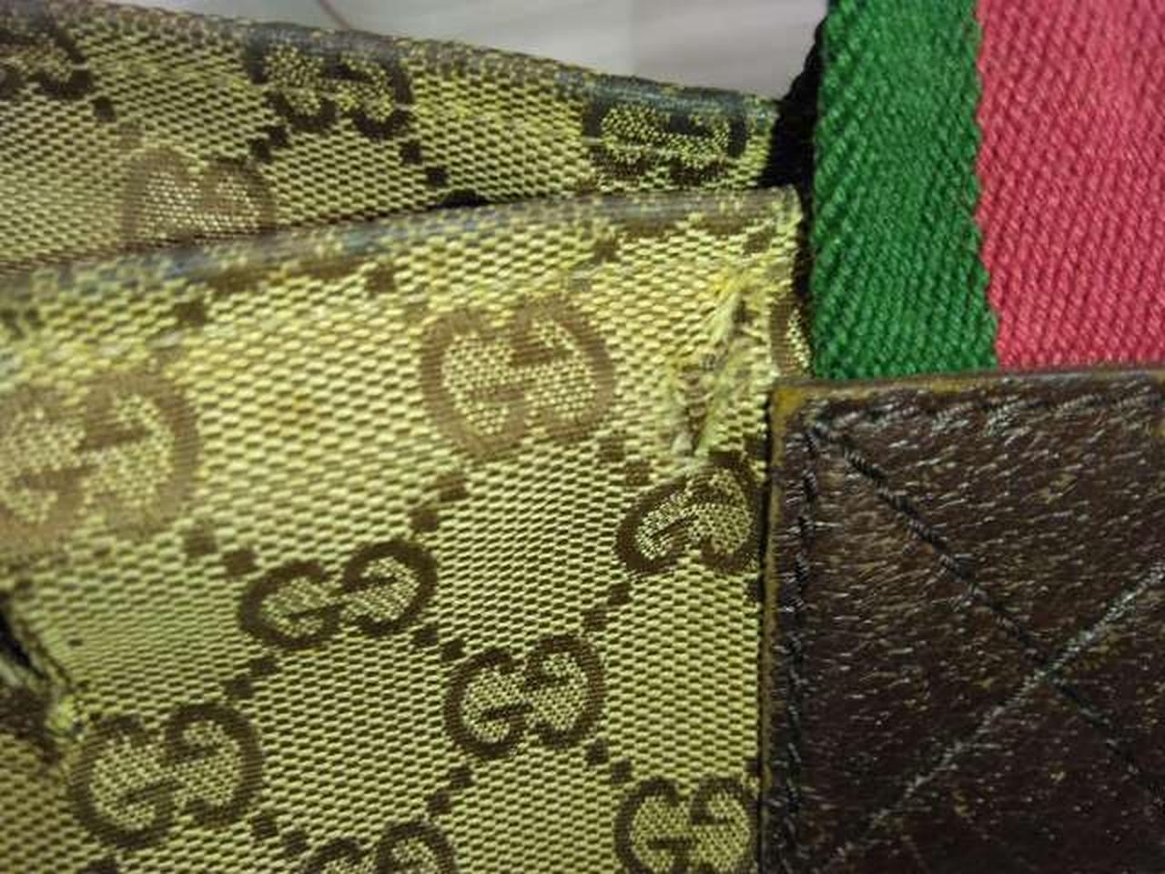 裏側取っ手向かって右破れです