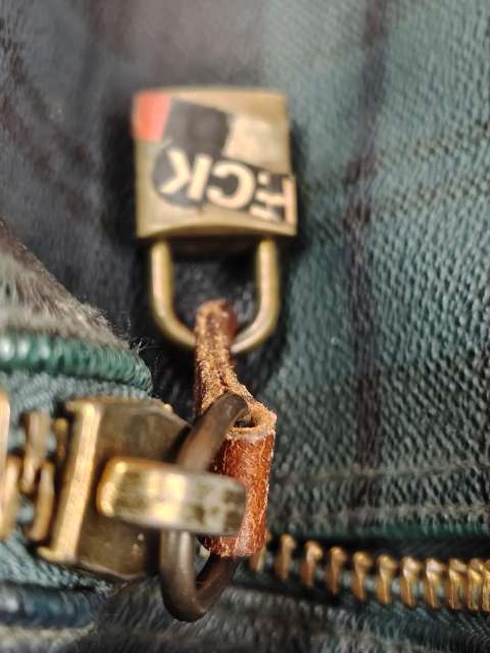 南京錠が付いているﾌｧｽﾅｰが固くて動き