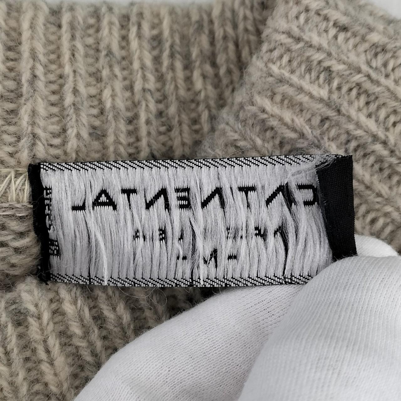 タグ、片方の縫い目解けてます。