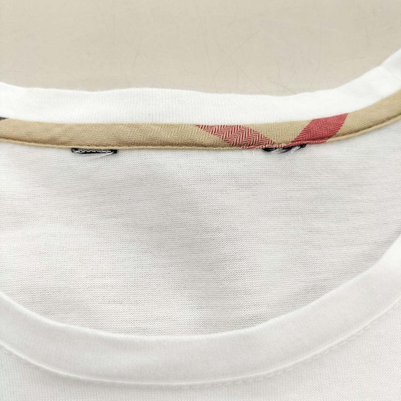 首元のタグが切り取られています