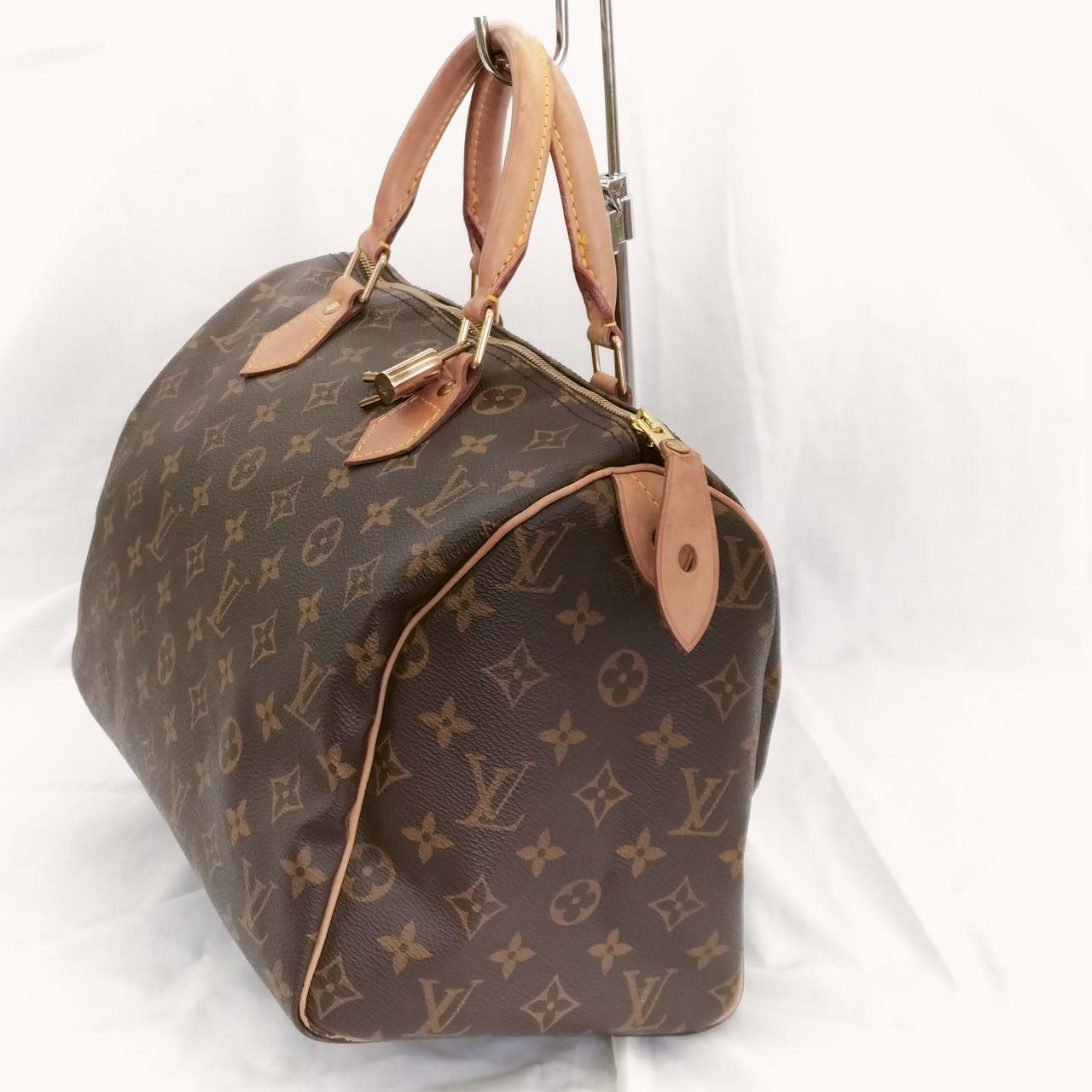 横から見た状態、縁部分、染みが有ります。