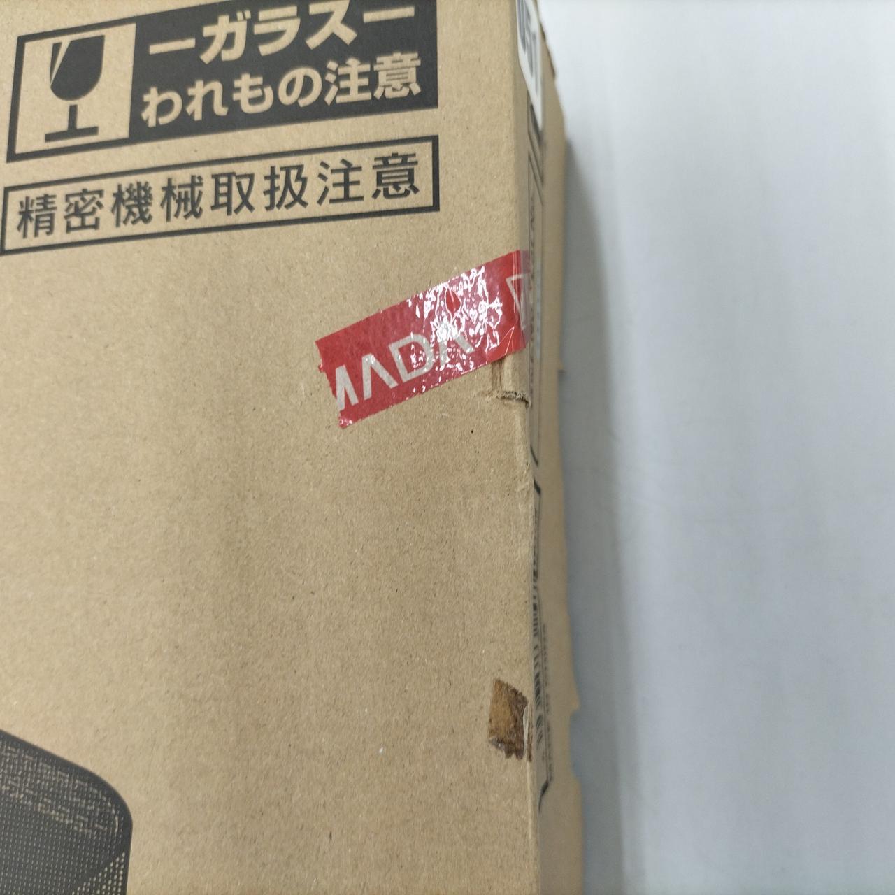 テープ貼付、ダメージあり