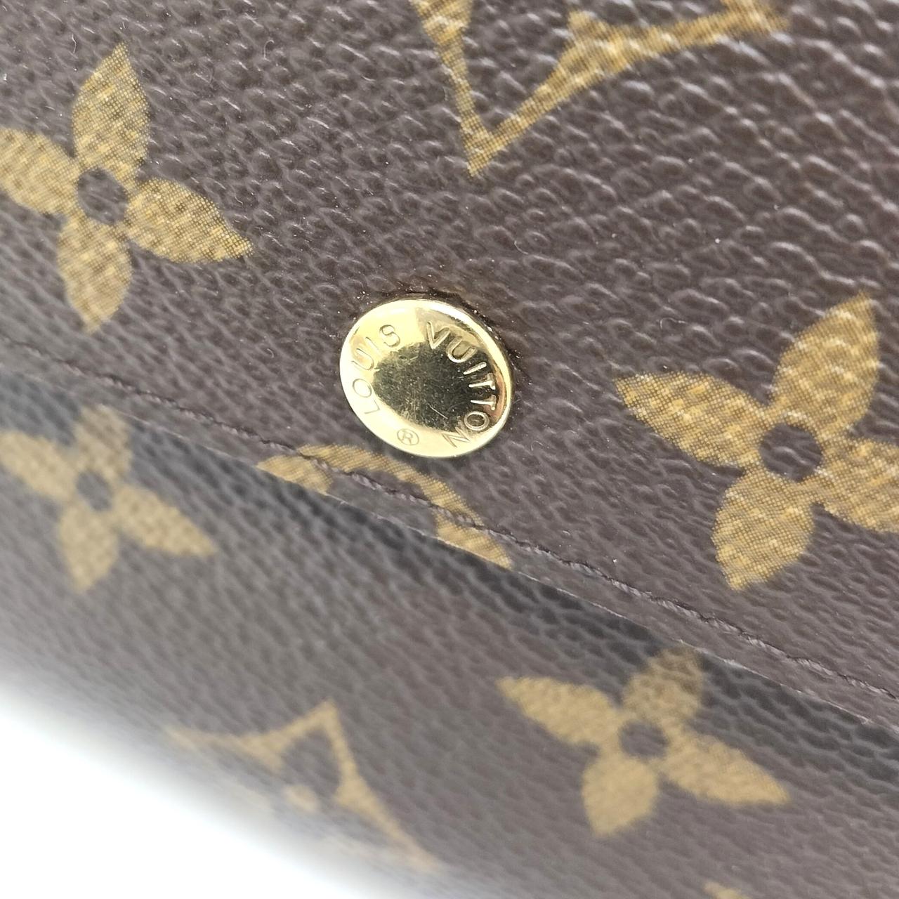 フラップのボタンに少々キズあり