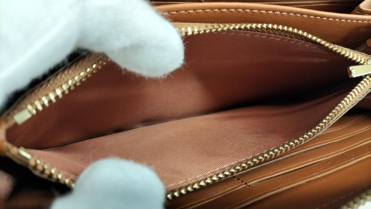 コーチ(COACH)|未使用コーチ スヌーピー✕シグネチャー長 財布