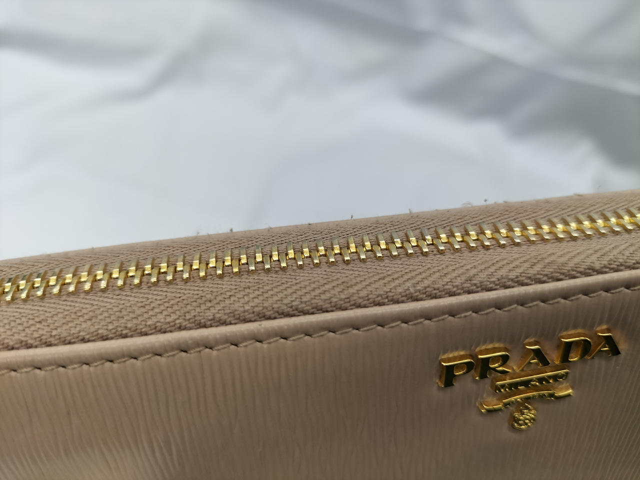 やや毛羽立ちあり