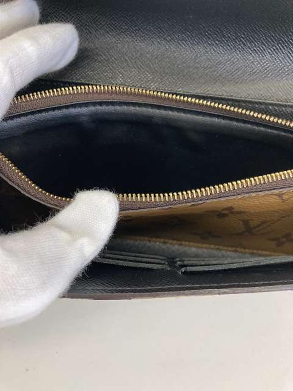 小銭入れ内部膨れあり