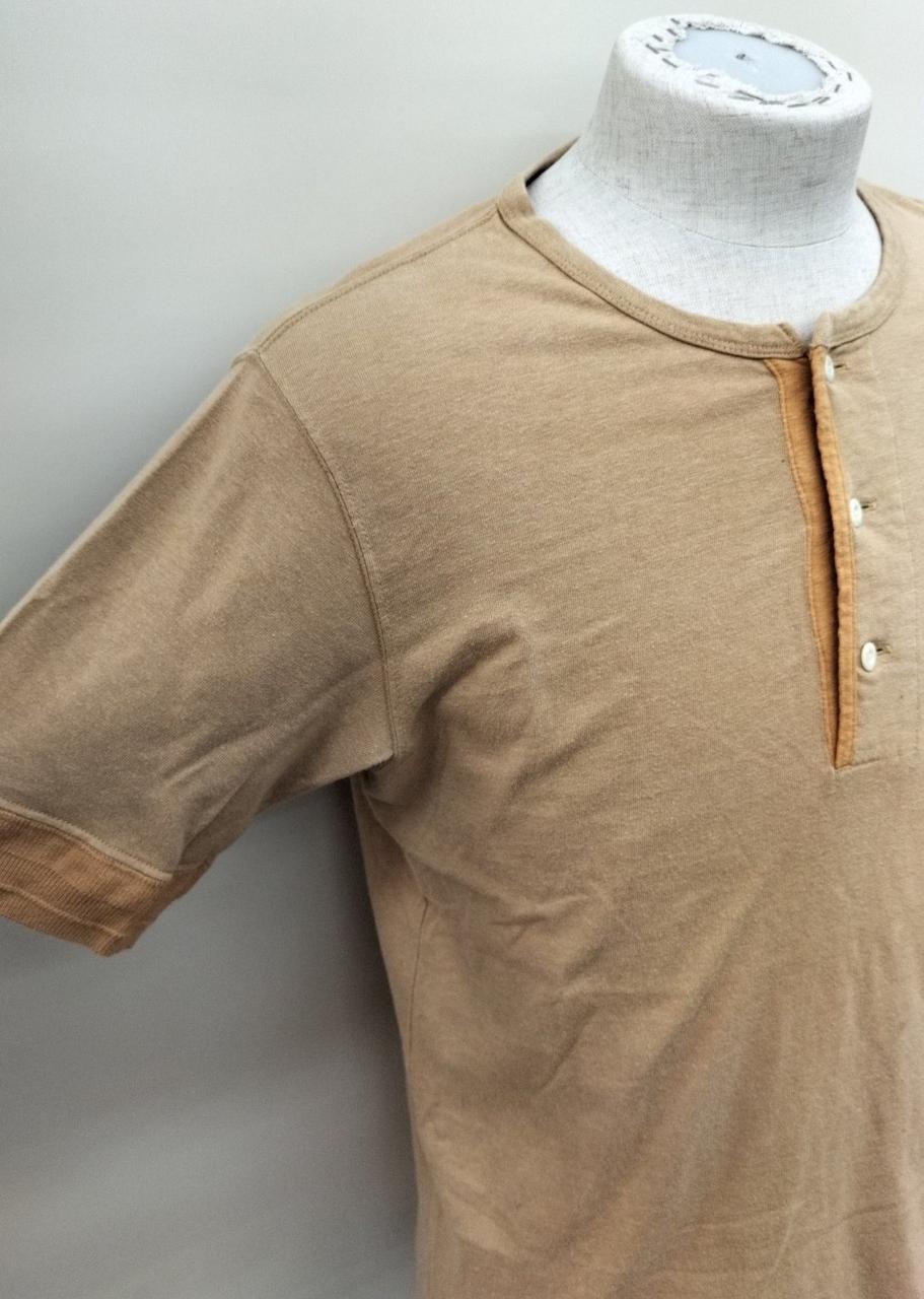 服全体的に毛羽立ち有。