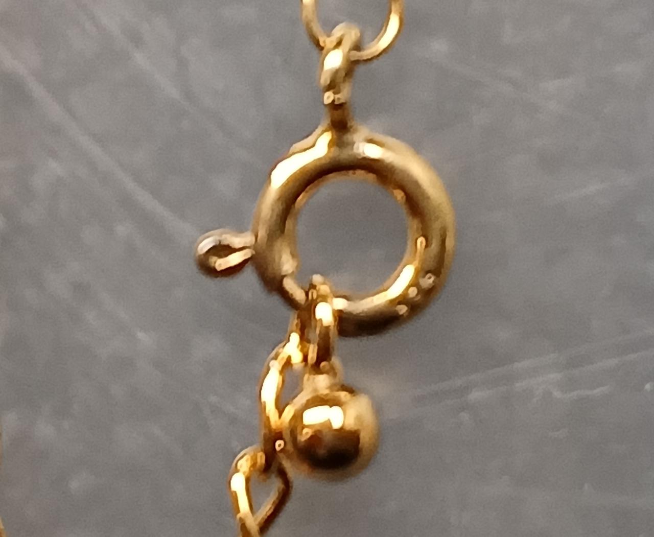 画像では分かりにくいですが925の記載有