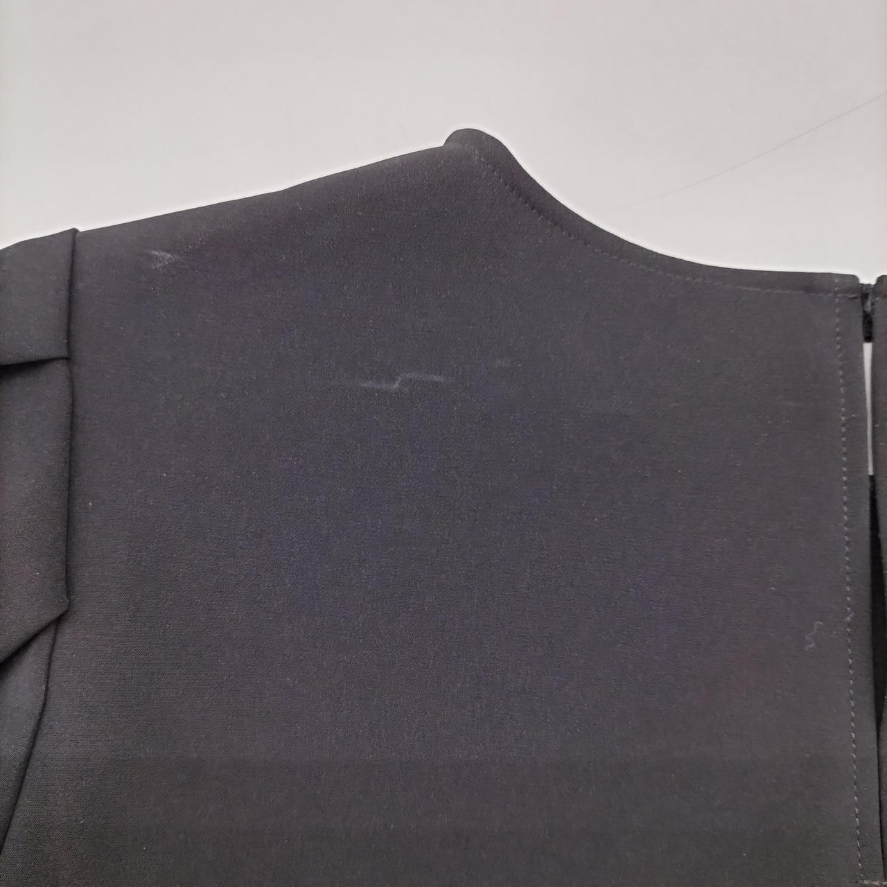 後ろに汚れあり