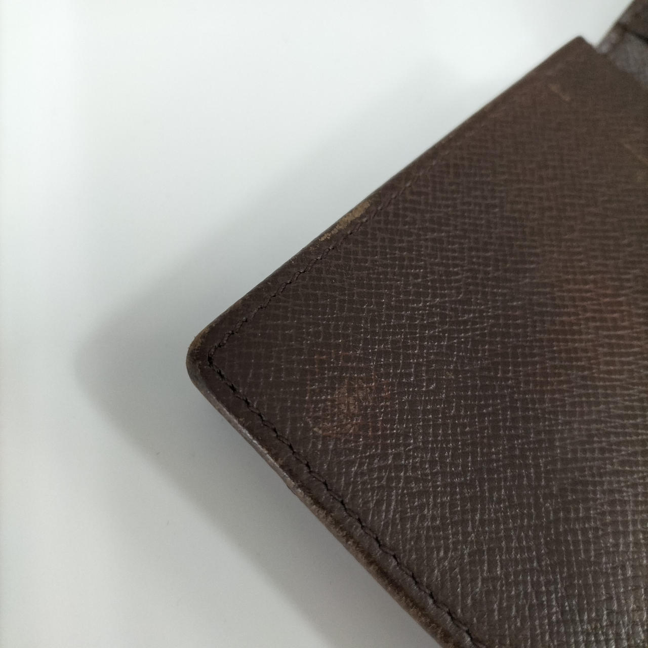 開いて左上側擦れ色落ち