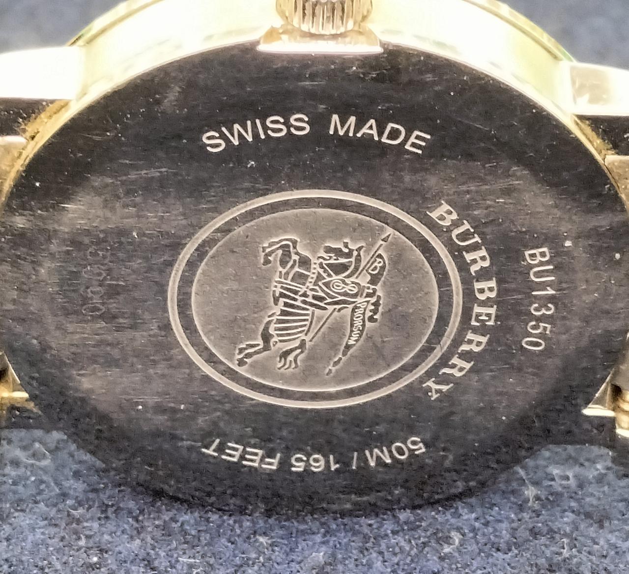 裏面擦り跡あります。