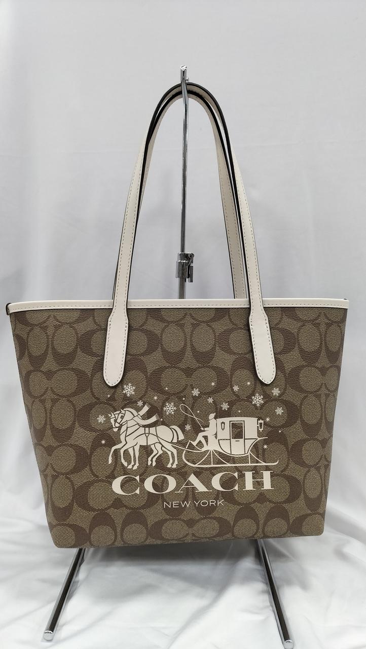 取っ手部分を軽く折り曲げて発送します