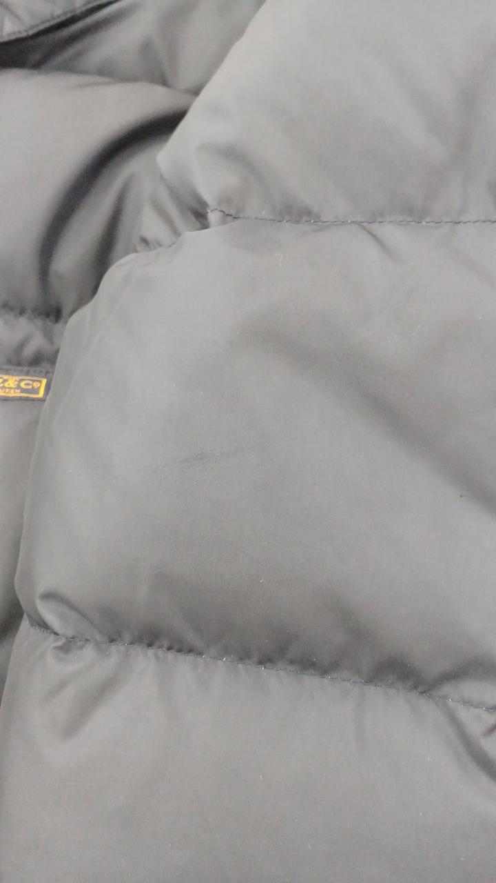 左袖前面、生地不良。