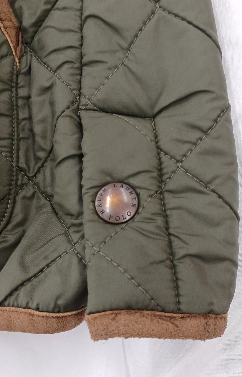 裾の左サイドを留めるボタンも使用感あり