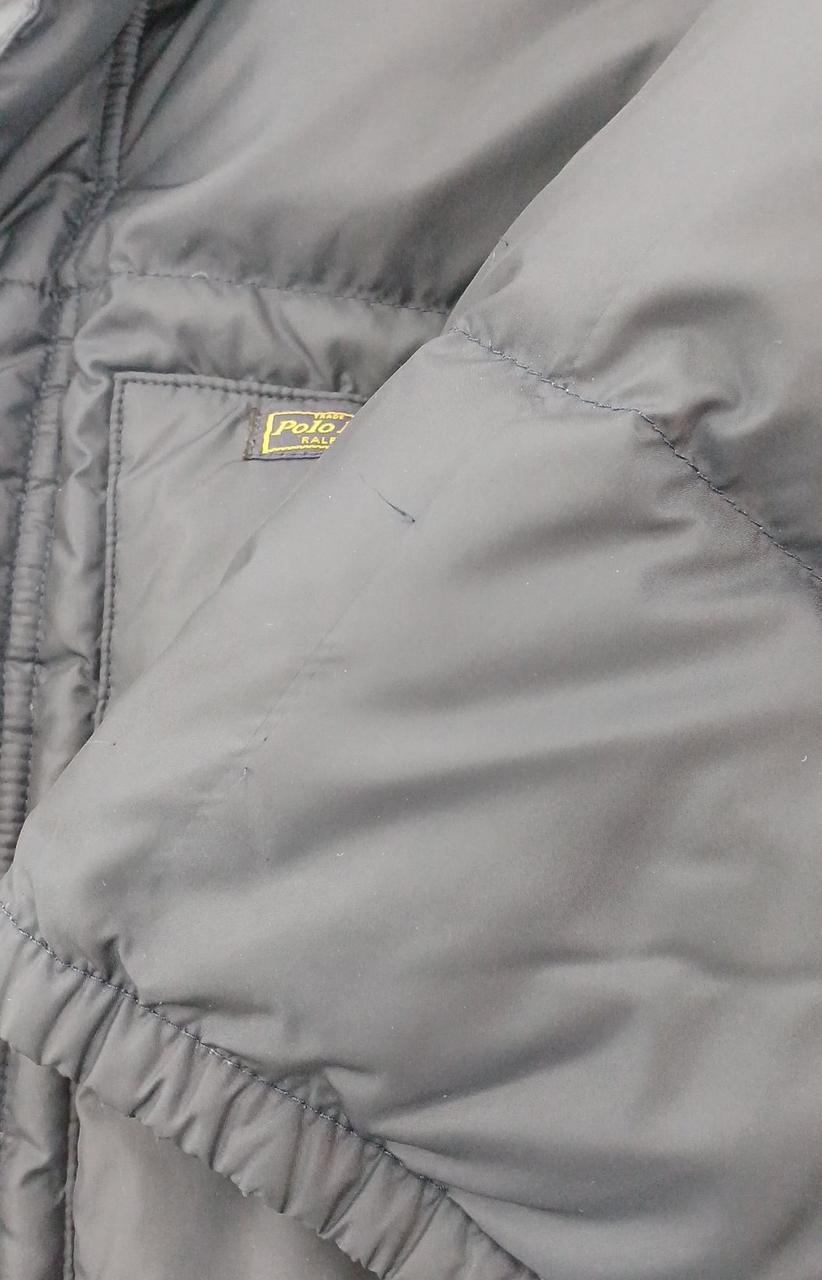 左袖後ろ側、ほつれあり。