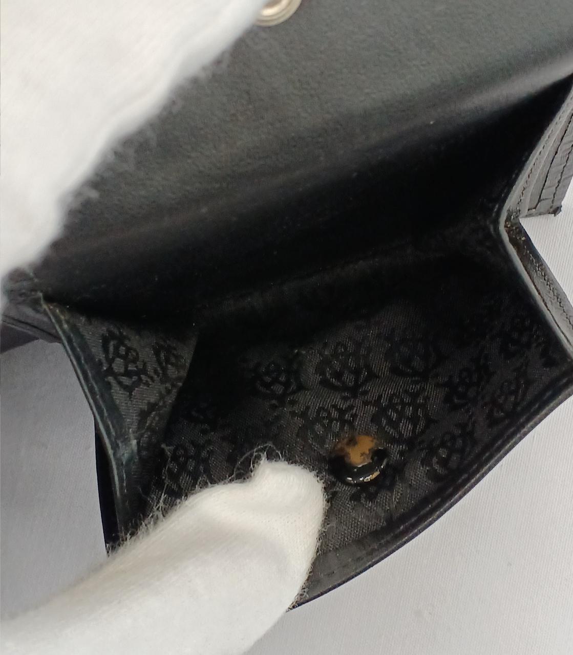 小銭入れ、ボタン裏サビあり。