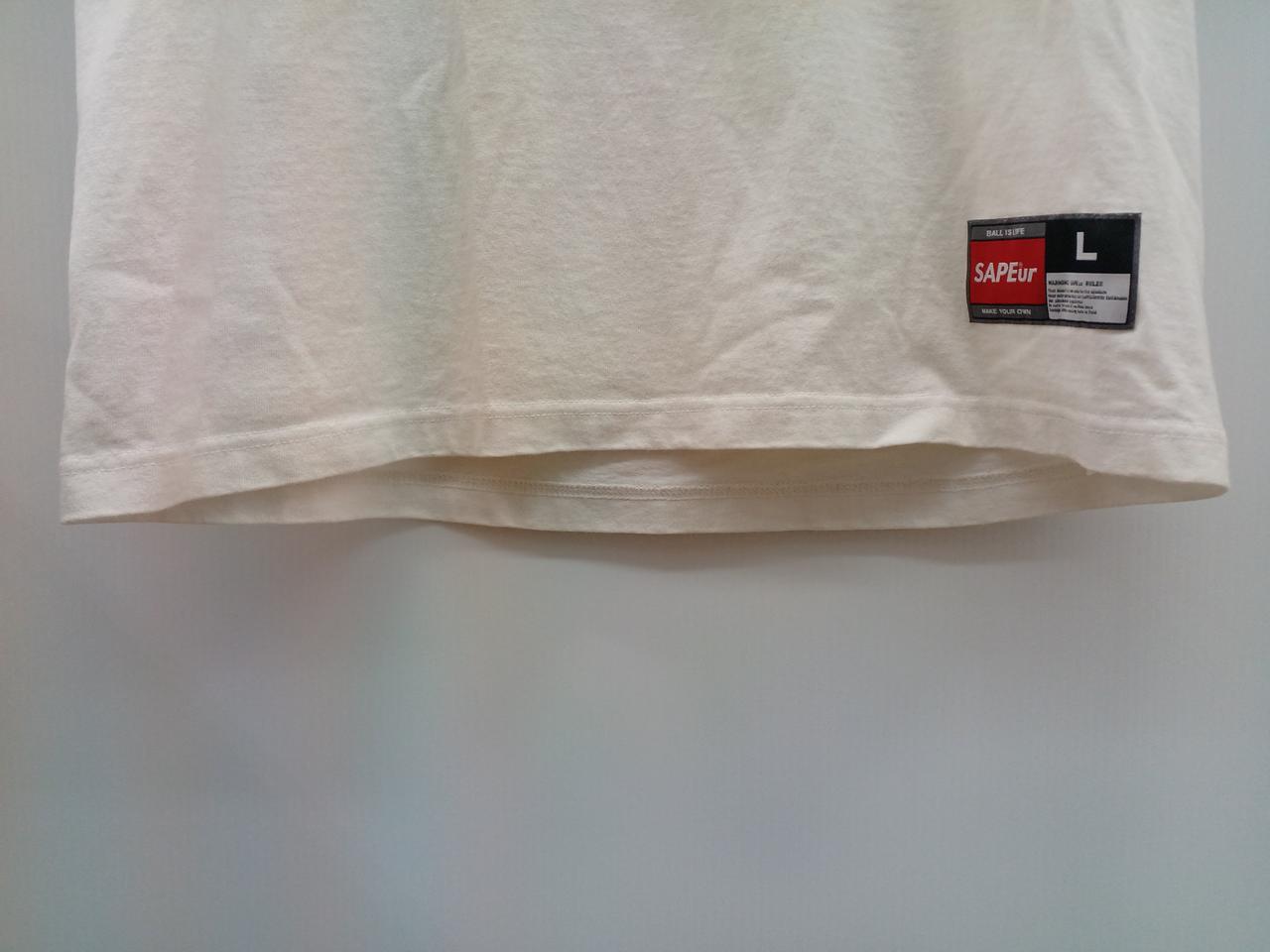 裾全体に黄ばみ汚れあり