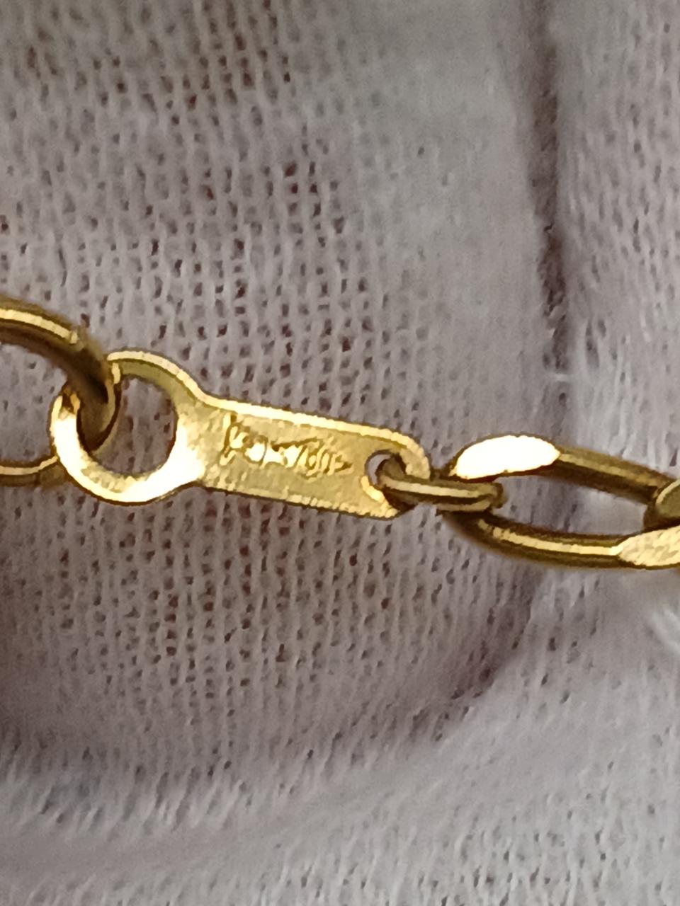 750刻印あり。