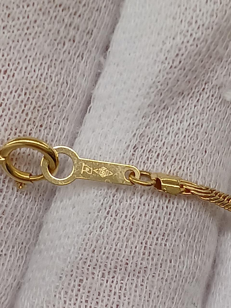 750刻印あり。