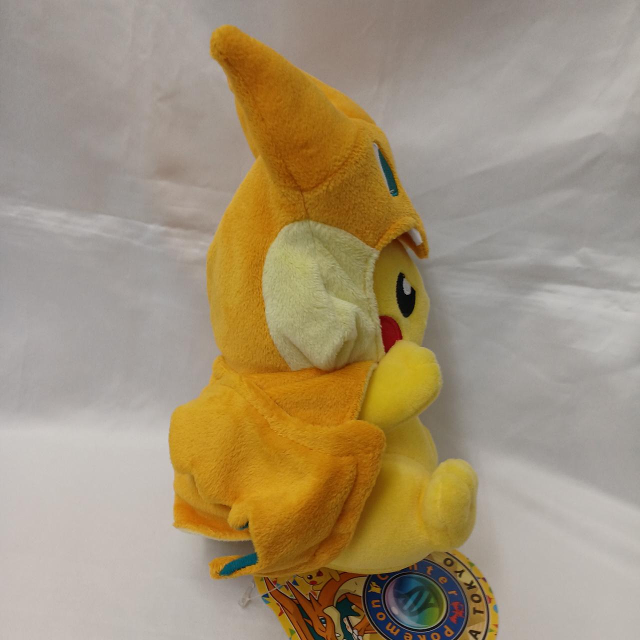 ポケモンセンター|メガリザードンYのポンチョを着たピカチュウ