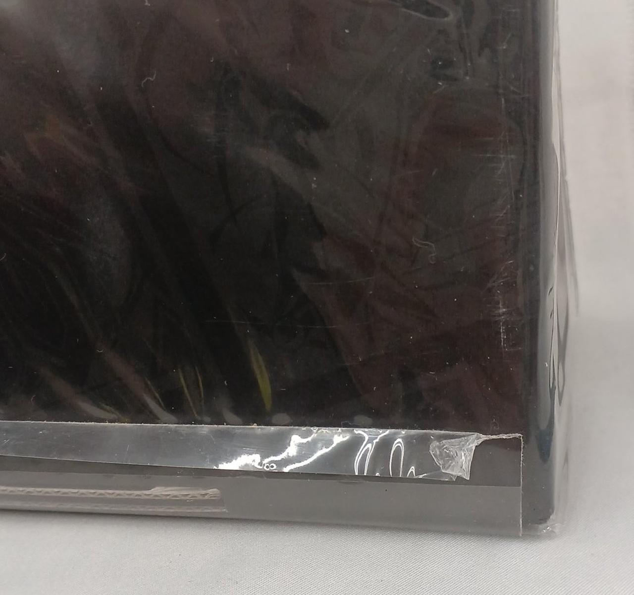 袋にダメージ有り、端のテープ千切れてます