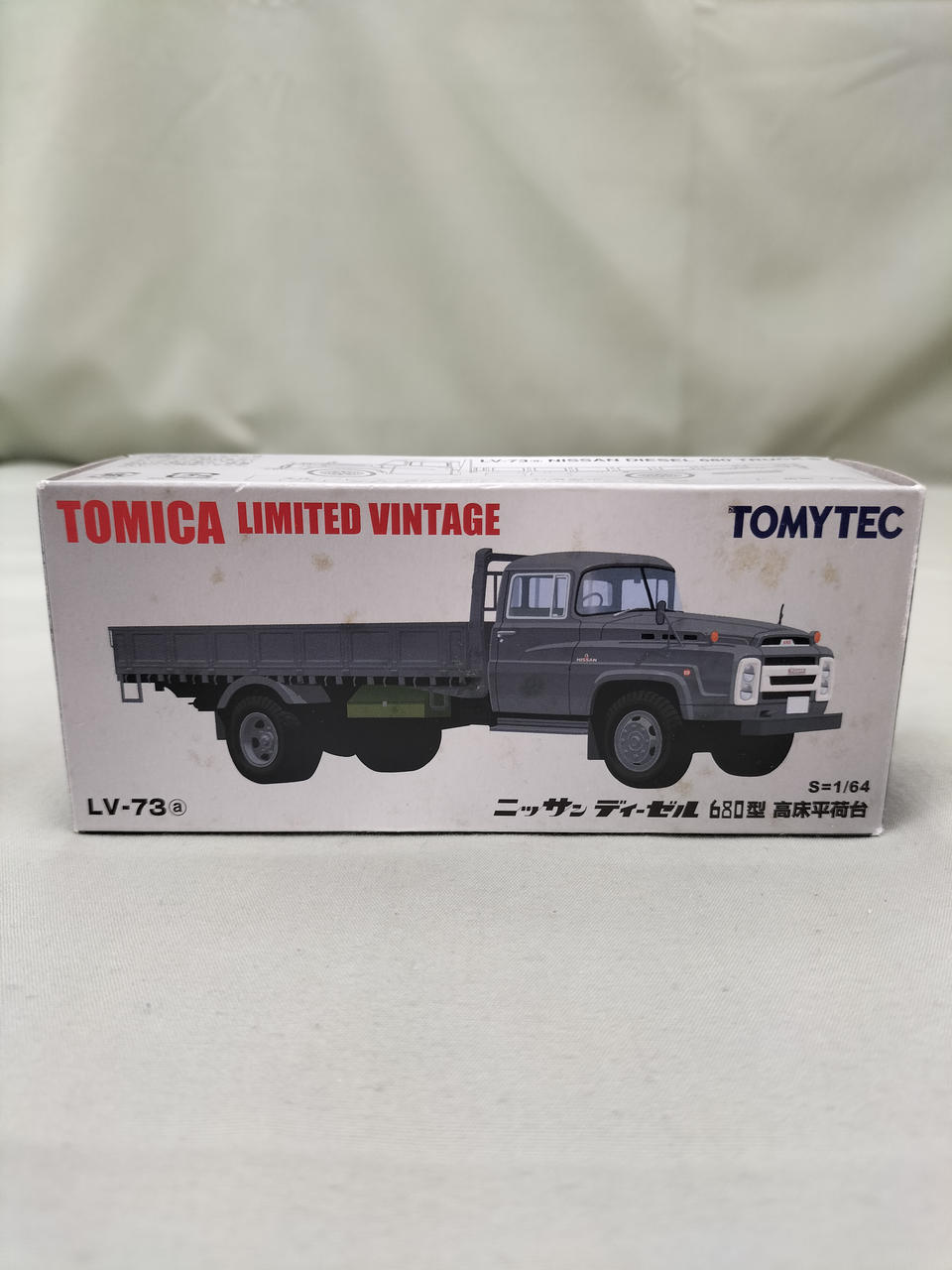 トミカリミテッドビンテージLV-73aニッサンディーゼル680型高床平荷台 TLV-73a 日産ディーゼル 680型 高床平荷台 (グレー) (ミニカー