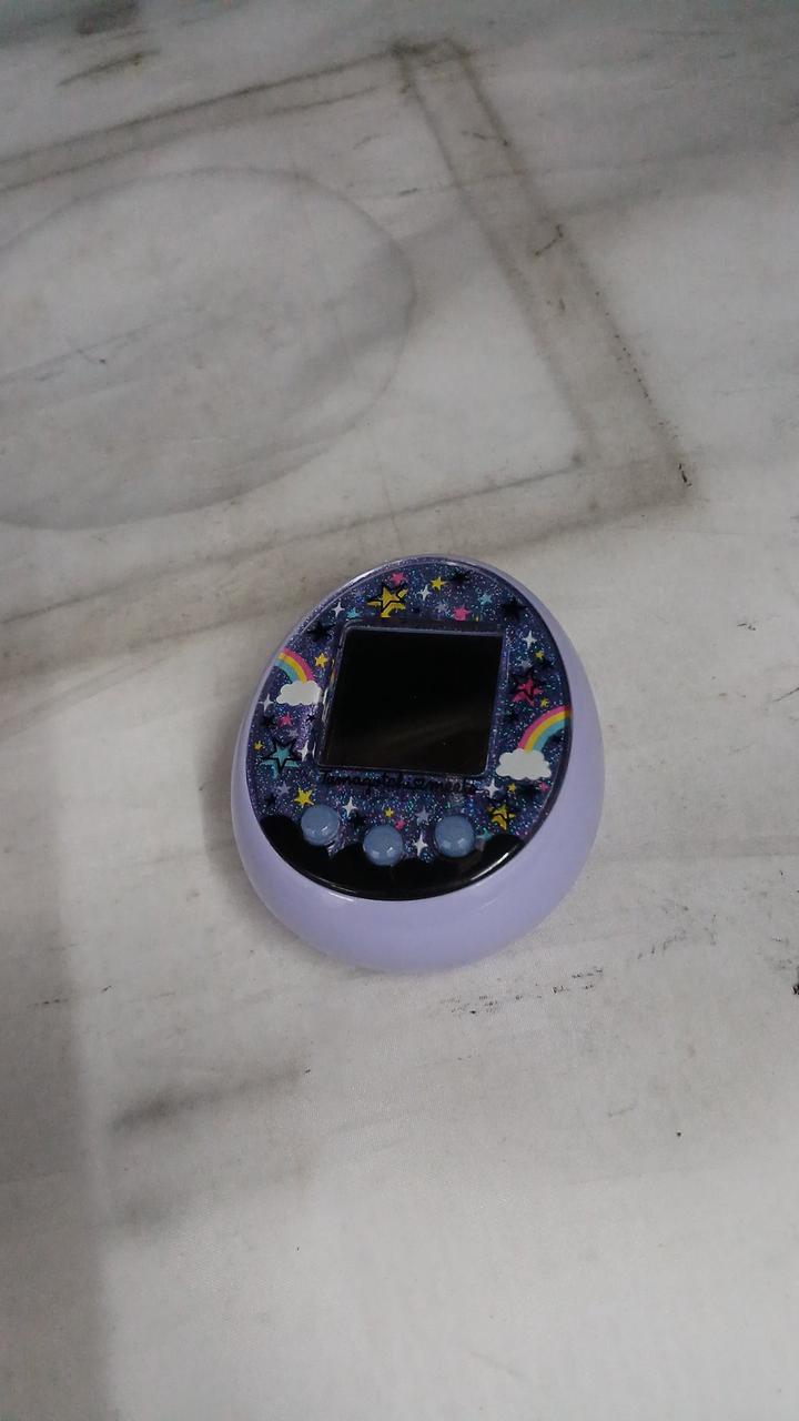 たまごっちみーつ マジカル カバー、ストラップ付き たまごっち