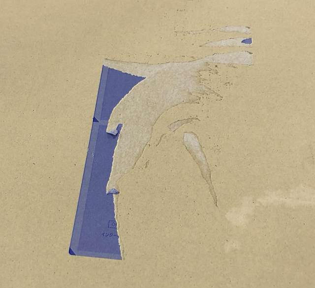 輸送箱ダメージあり