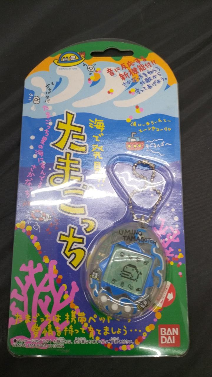 海で発見たまごっち クリアブルー ジャンク品 ふき取れ
