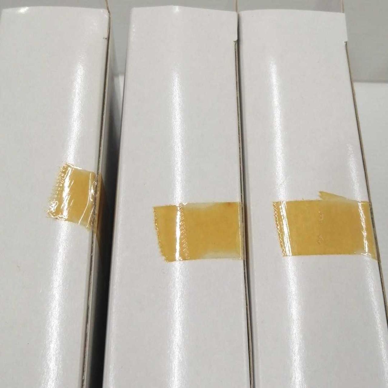 検品でのテープ２重貼りと思われます