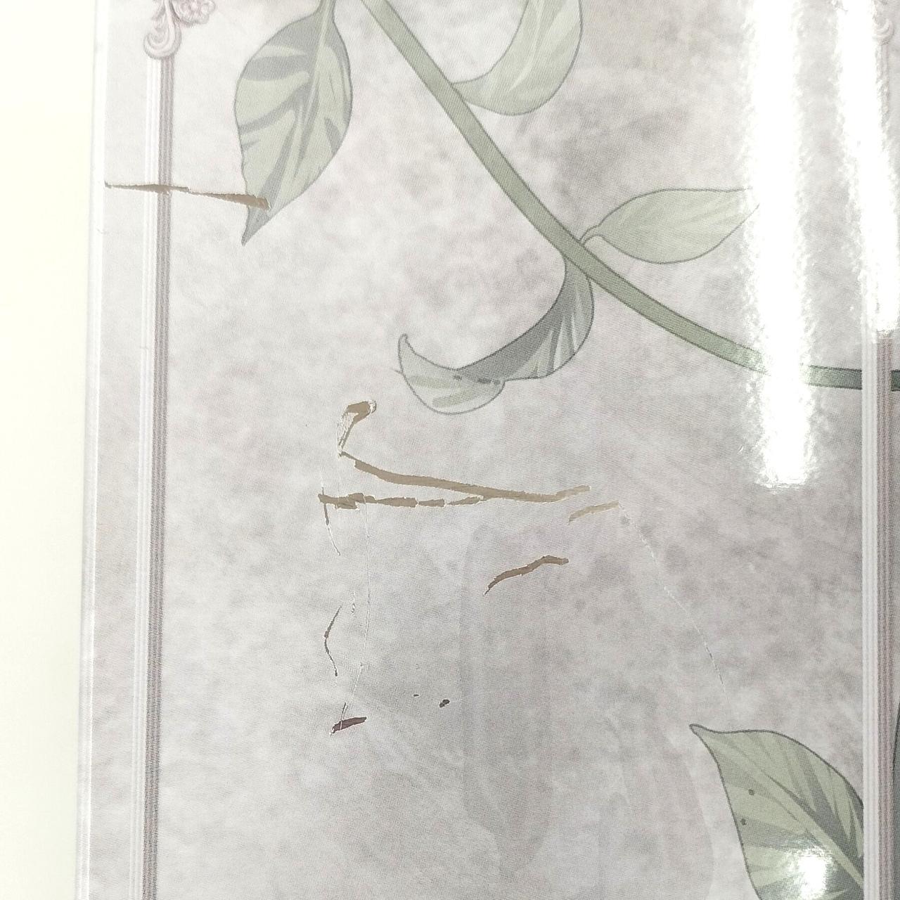 缶の左側面部にダメージあり