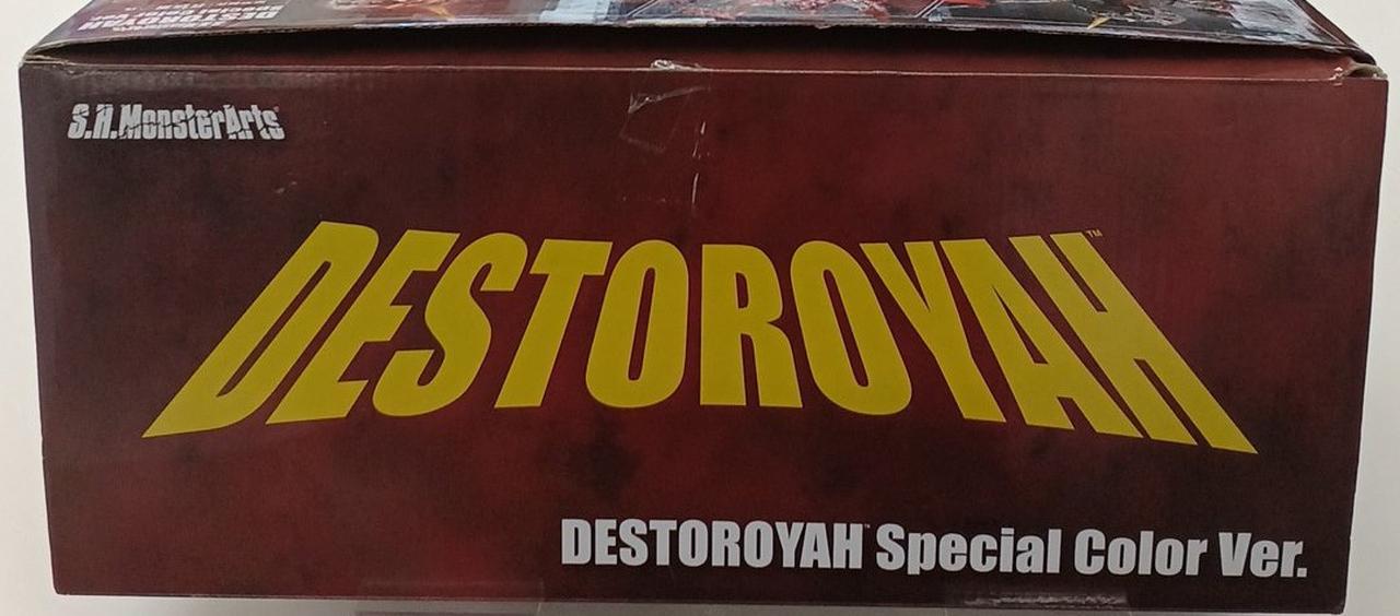 テープ二度貼り痕あり