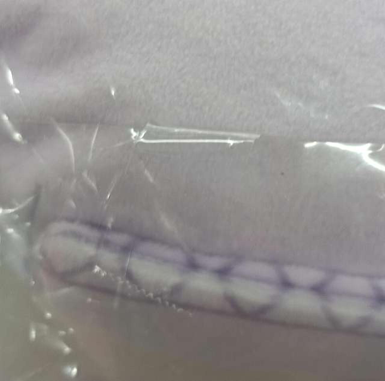 袋　テープ貼付部分