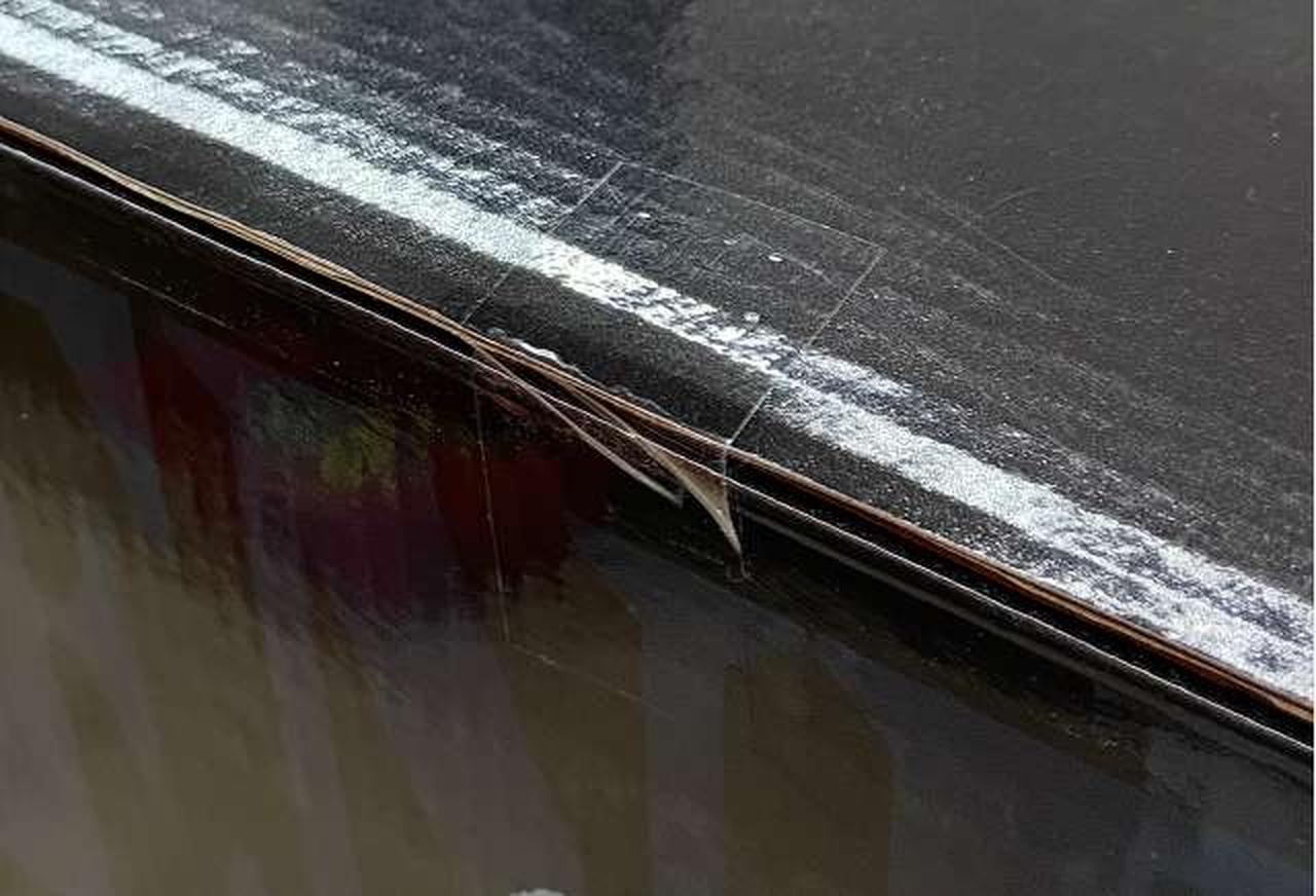 商品　テープ貼付部分①