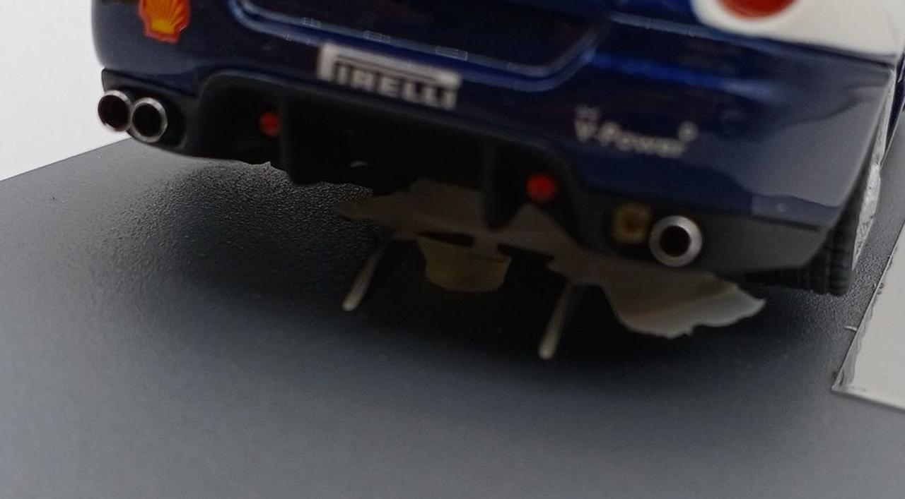 マフラー部品外れあり、車体後方裏破損あり