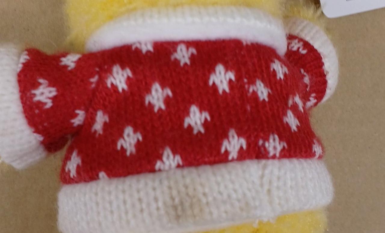 背中側セーターの白い部分にシミあります