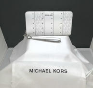 JET SET TRAVELスタッズ パッチワーク 長財布|MICHAEL KORS