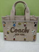 スヌーピーコラボショルダーバッグ|COACH