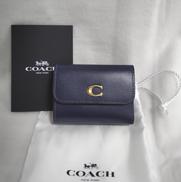 三つ折り財布（保護袋付）|COACH