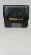 シマメタルバーWホック二つ折り財布|GUCCI